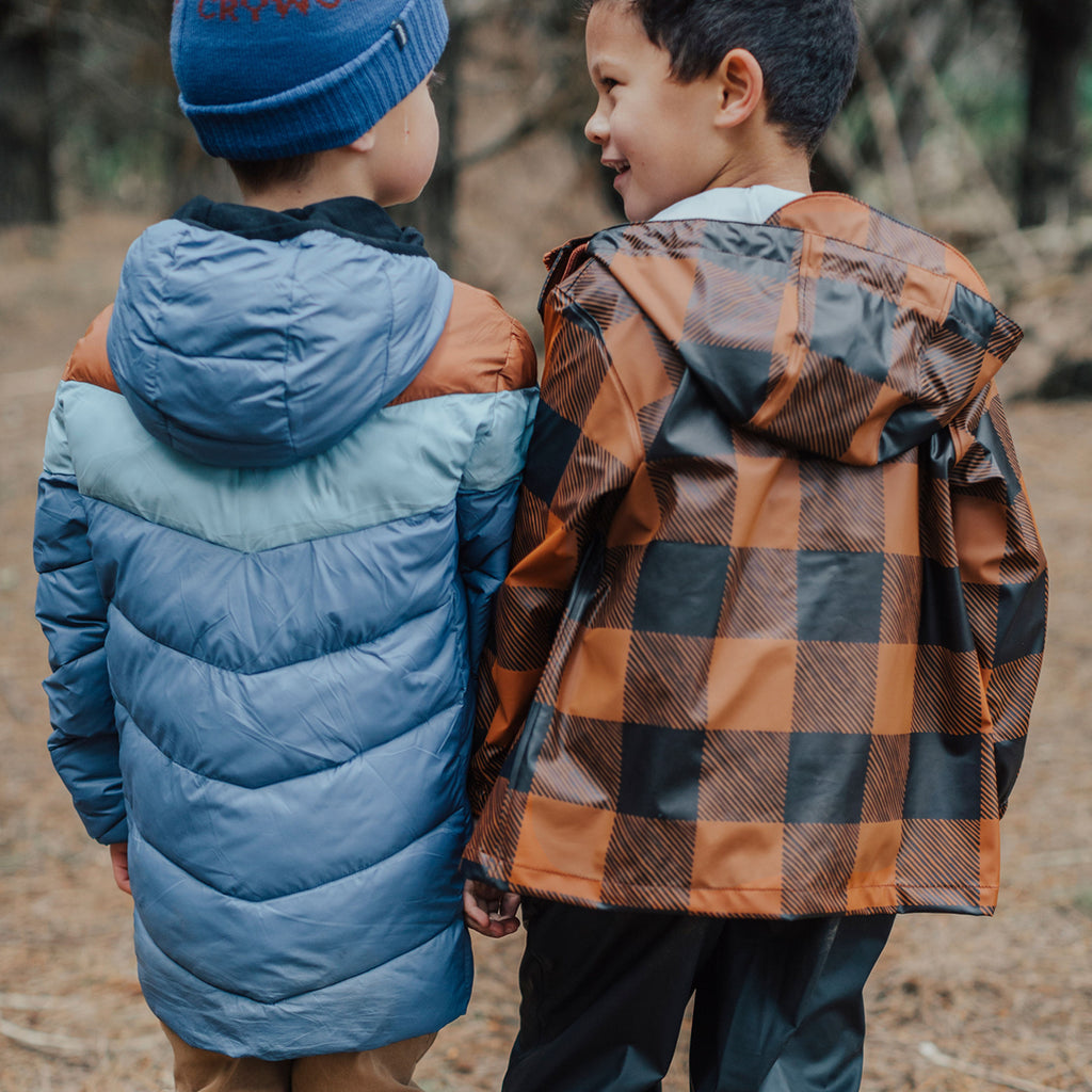 Two boys wearing Play Jacket Rust Plaid